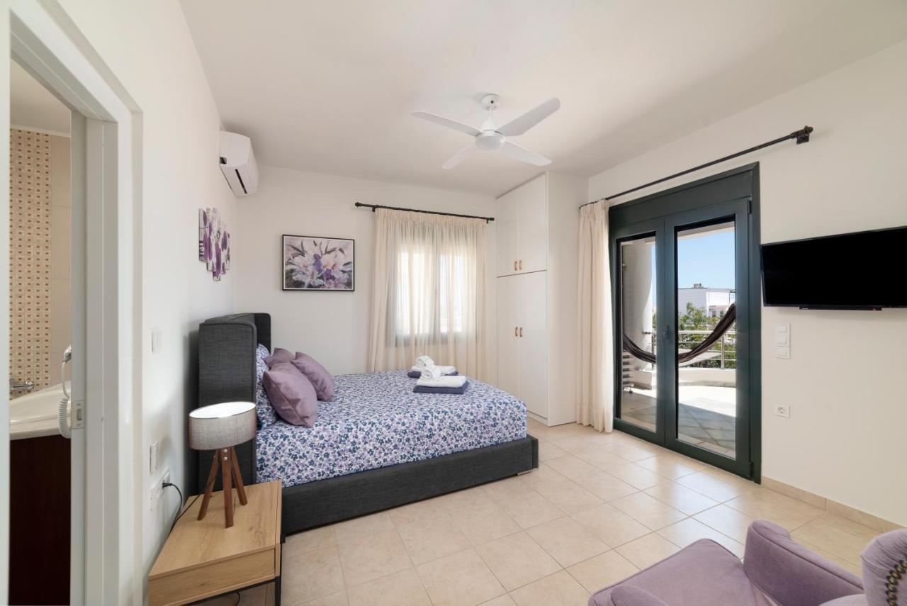 Paradisos Luxury Villas Next To Beach Koutsourás エクステリア 写真